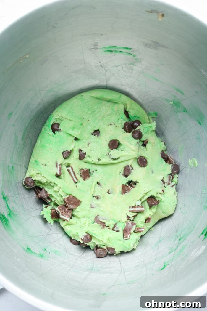 Mint chocolate chip cookie dough with visible chips and chopped Andes mints.
