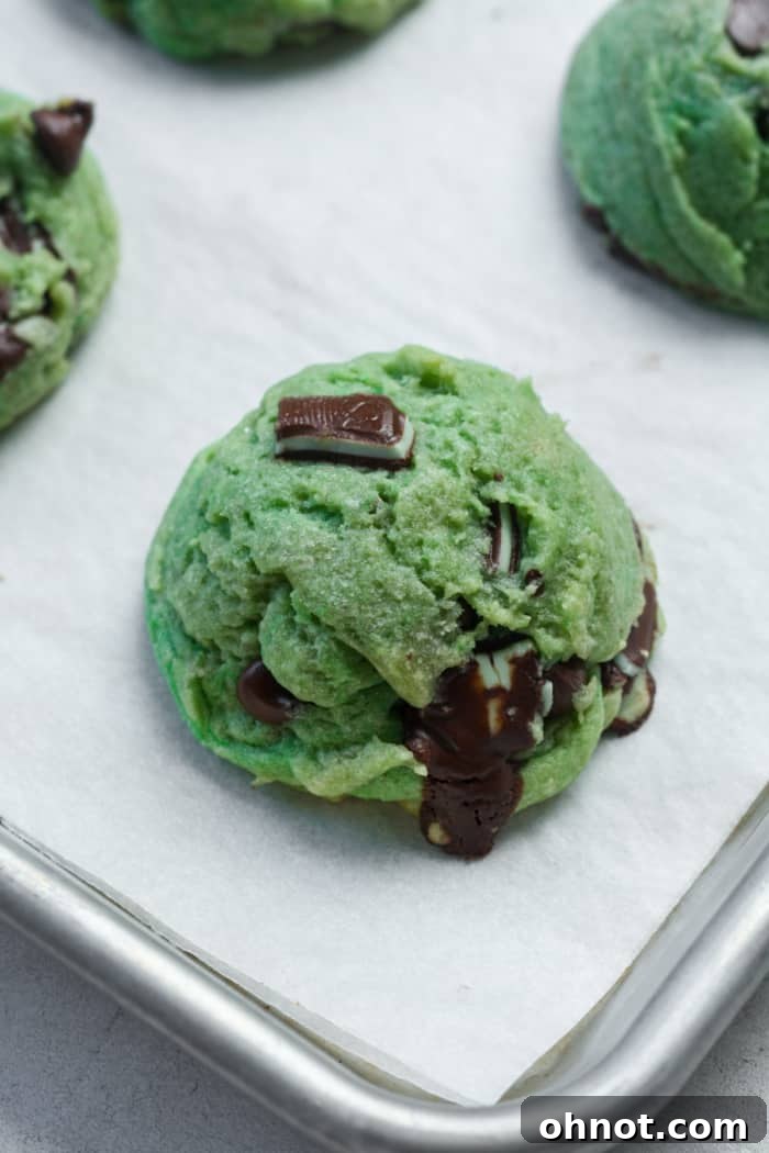 Tray of baked green mint cookies.