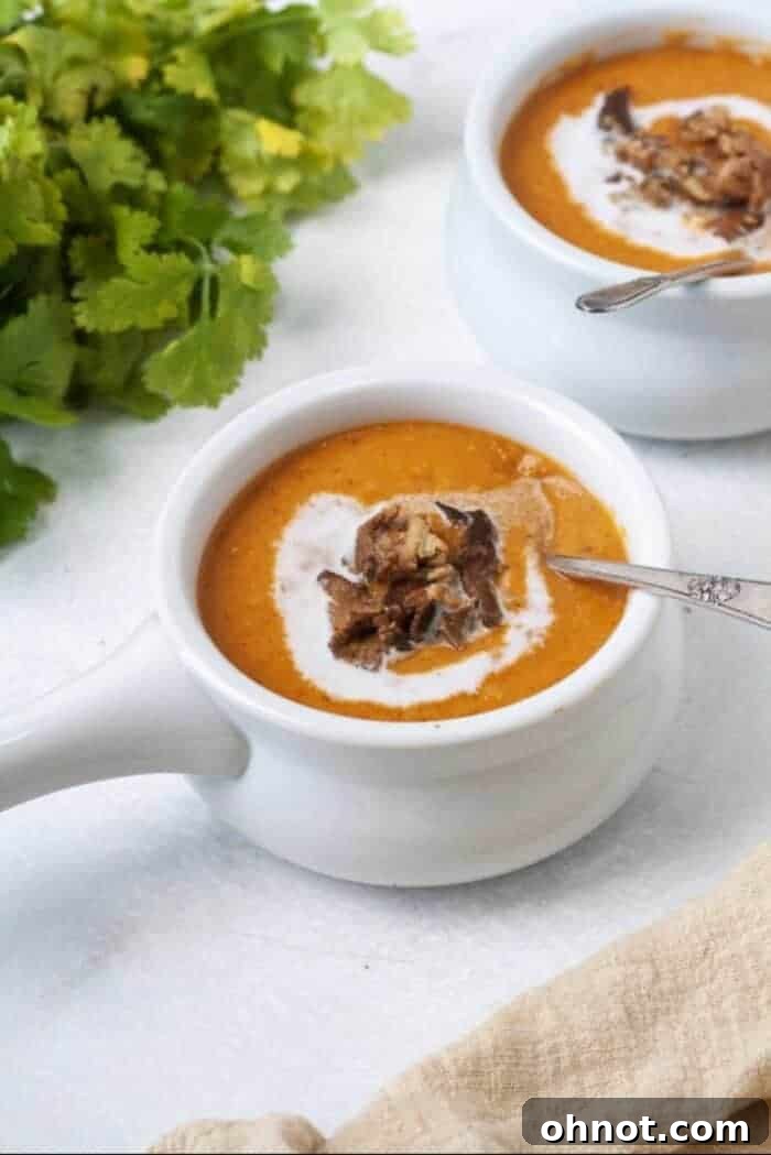 Creamy Whole30 Butternut Squash Soup topped with crispy bacon