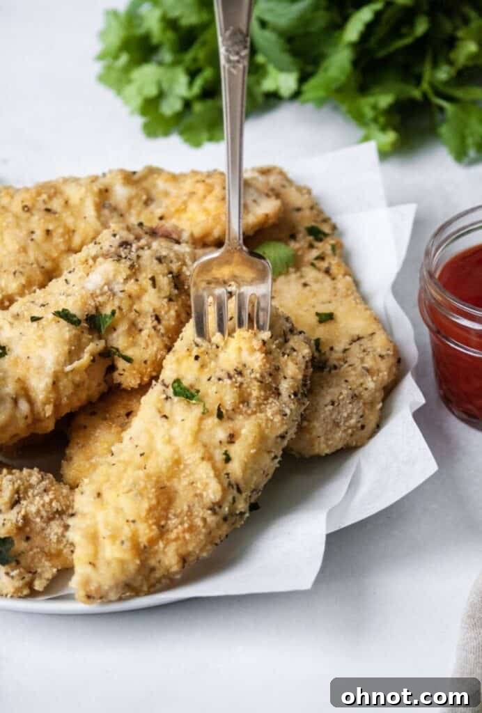 Breaded chicken with fork