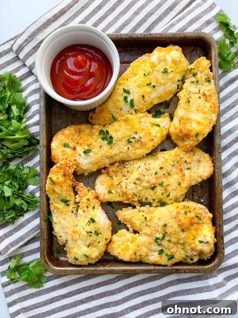 Crispy Paleo chicken tenders on air fryer sheet