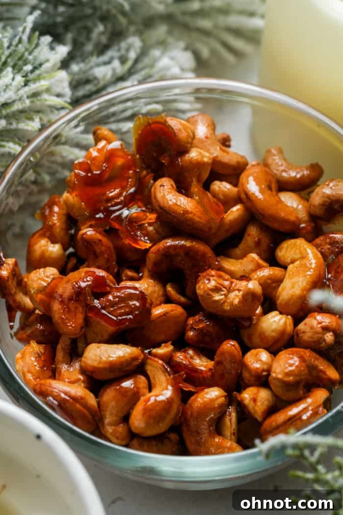 A bowl overflowing with perfectly roasted, golden honey cashews, ready for snacking or serving.