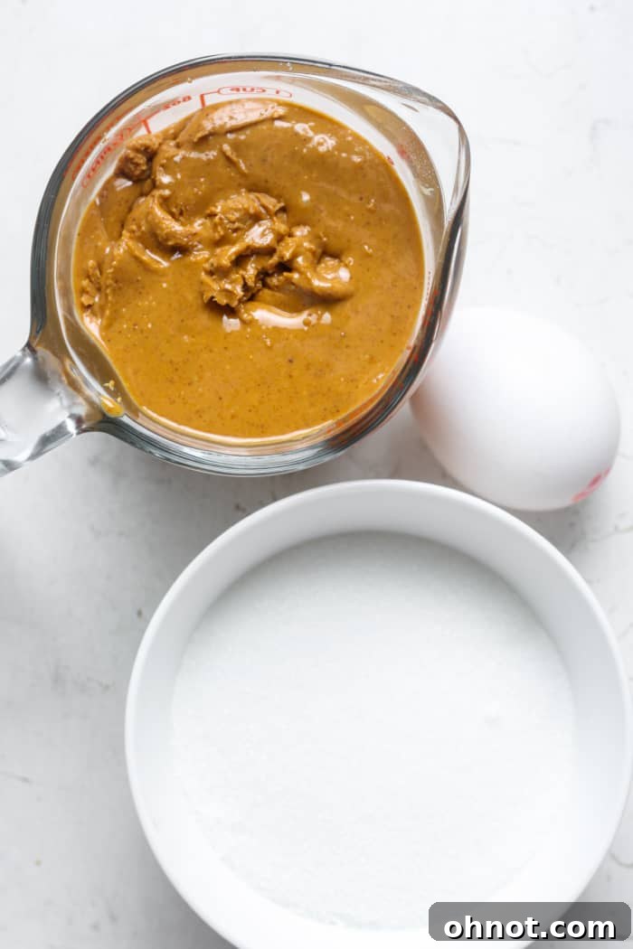 Peanut butter and monk fruit sweetener in bowls, ready for baking.
