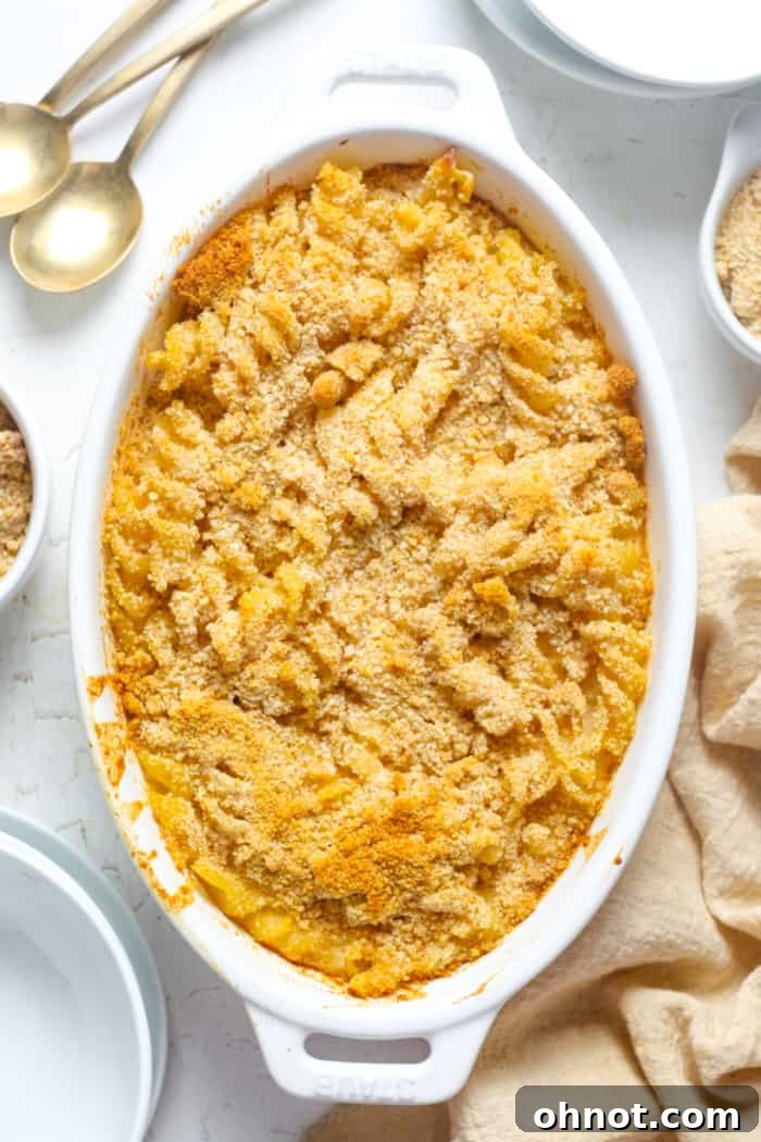 Gluten-free baked mac and cheese fresh out of the oven, golden and bubbly.
