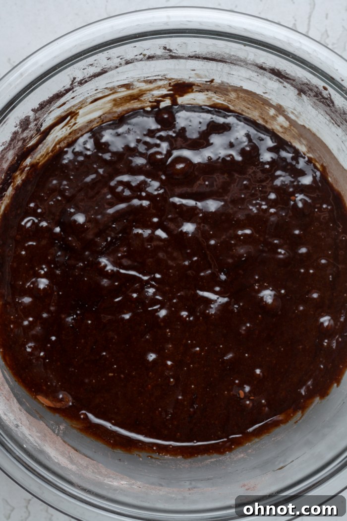 Thick, fudgy healthy brownie dough ready for baking.