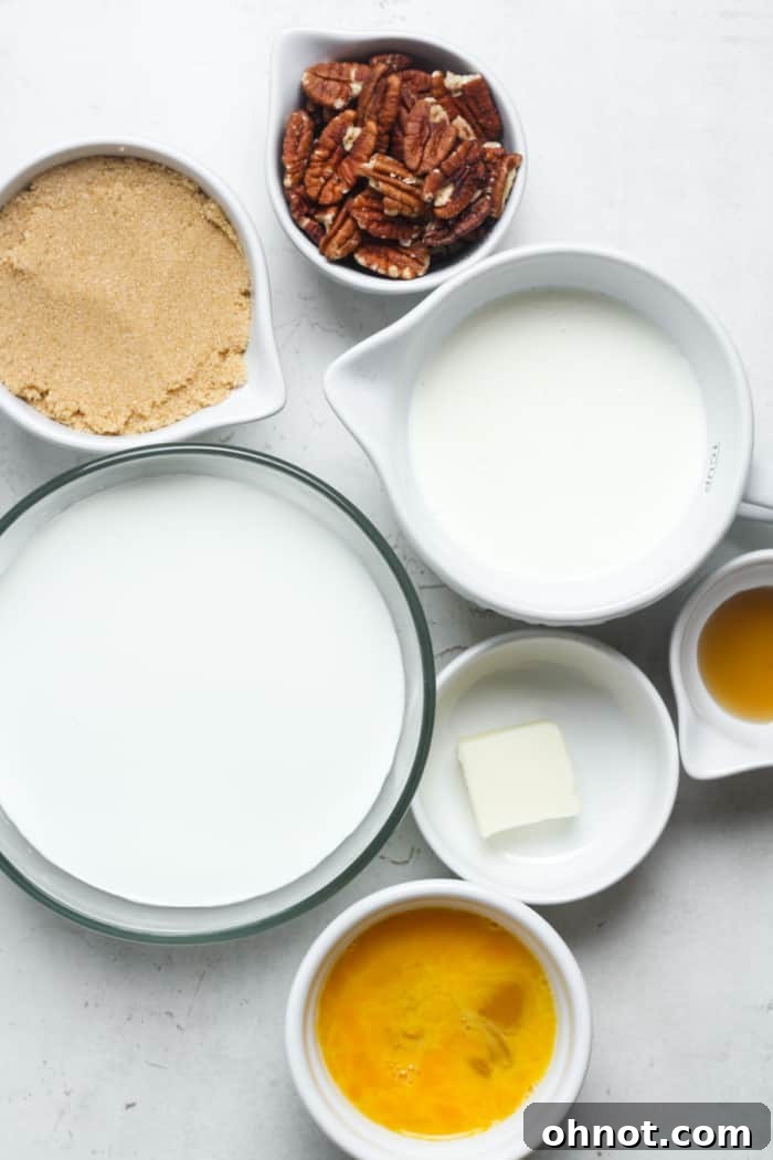 Assortment of ingredients for butter pecan ice cream laid out on a table.