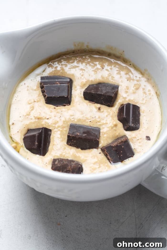 Blended oatmeal with chocolate chunks on top.
