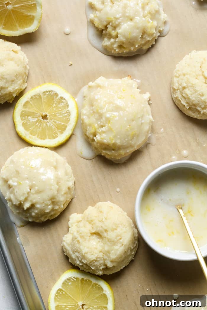 Glazed lemon ricotta cookies, stacked and ready to eat.