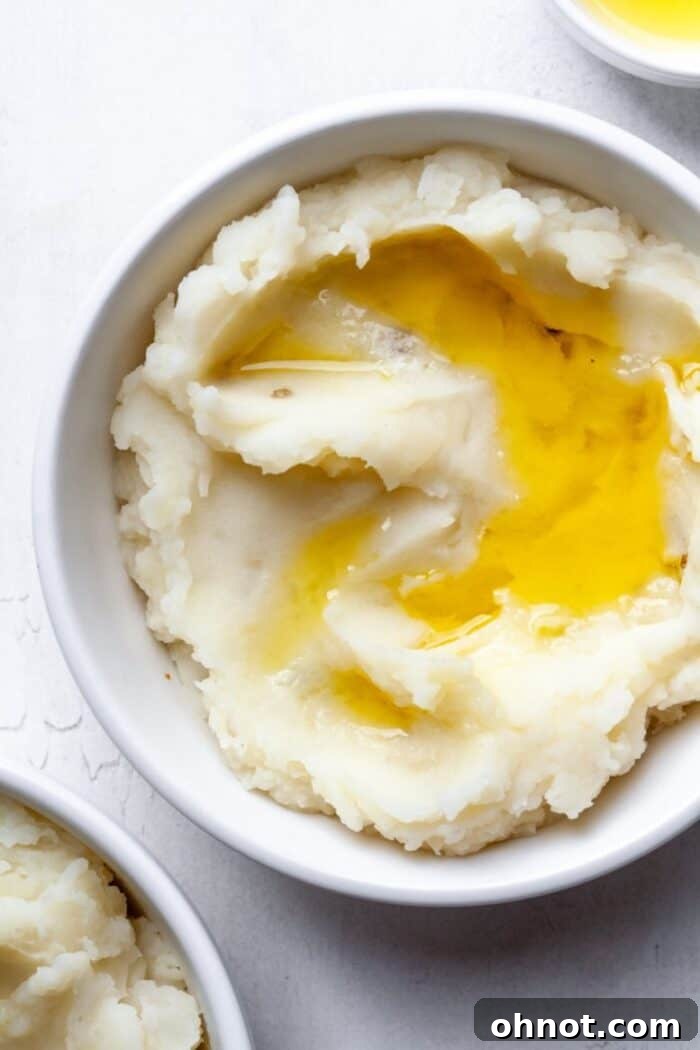 Bowl of creamy Paleo mashed potatoes, ready to serve