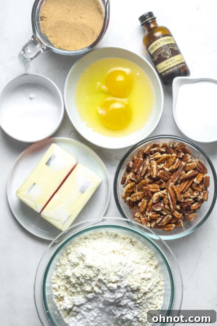 Ingredients for making delicious pecan cookies laid out on a kitchen counter.