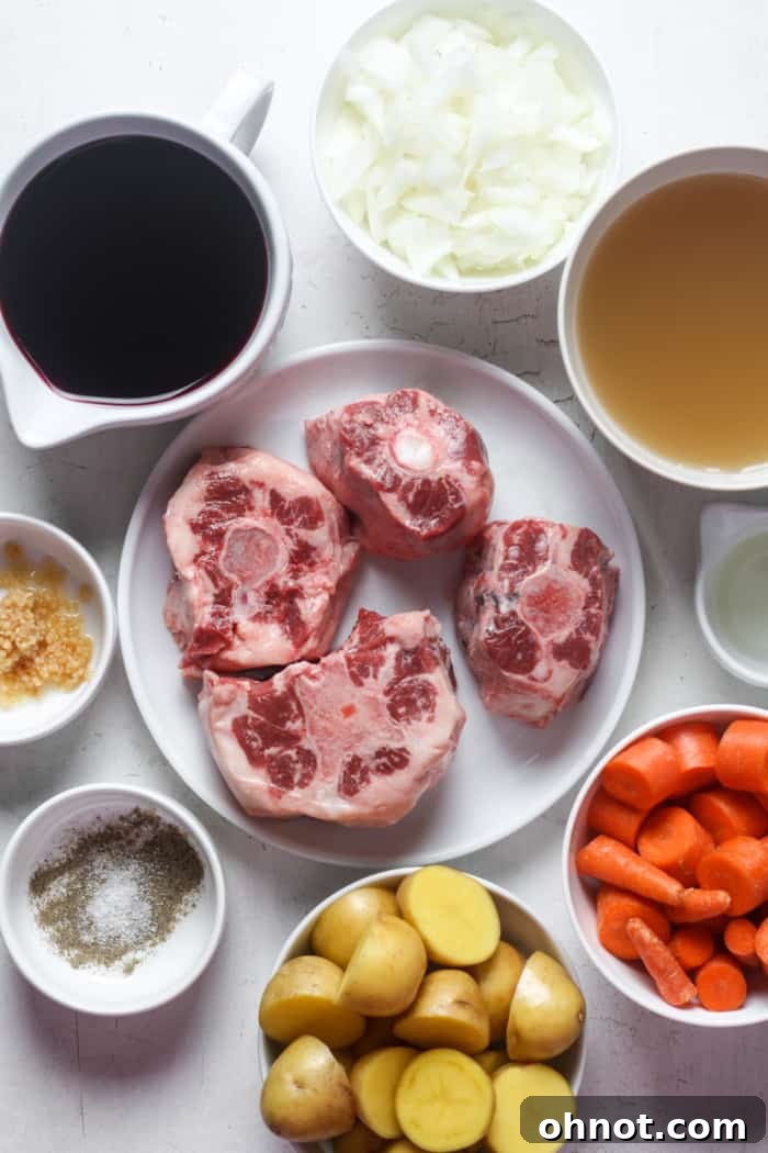 Recipe for oxtail stew simmering in a Dutch oven.