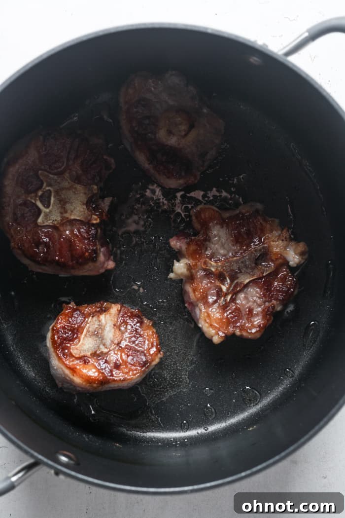 Golden-brown seared beef meat pieces.