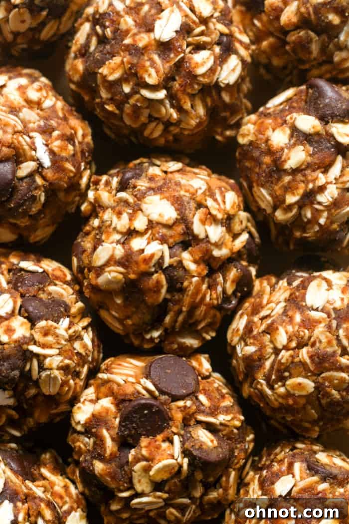 Close-up of a stack of healthy oat energy bites, showcasing their appealing texture and wholesome ingredients.