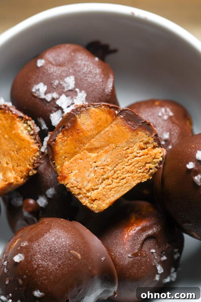 Healthy peanut butter balls arranged on a serving plate.
