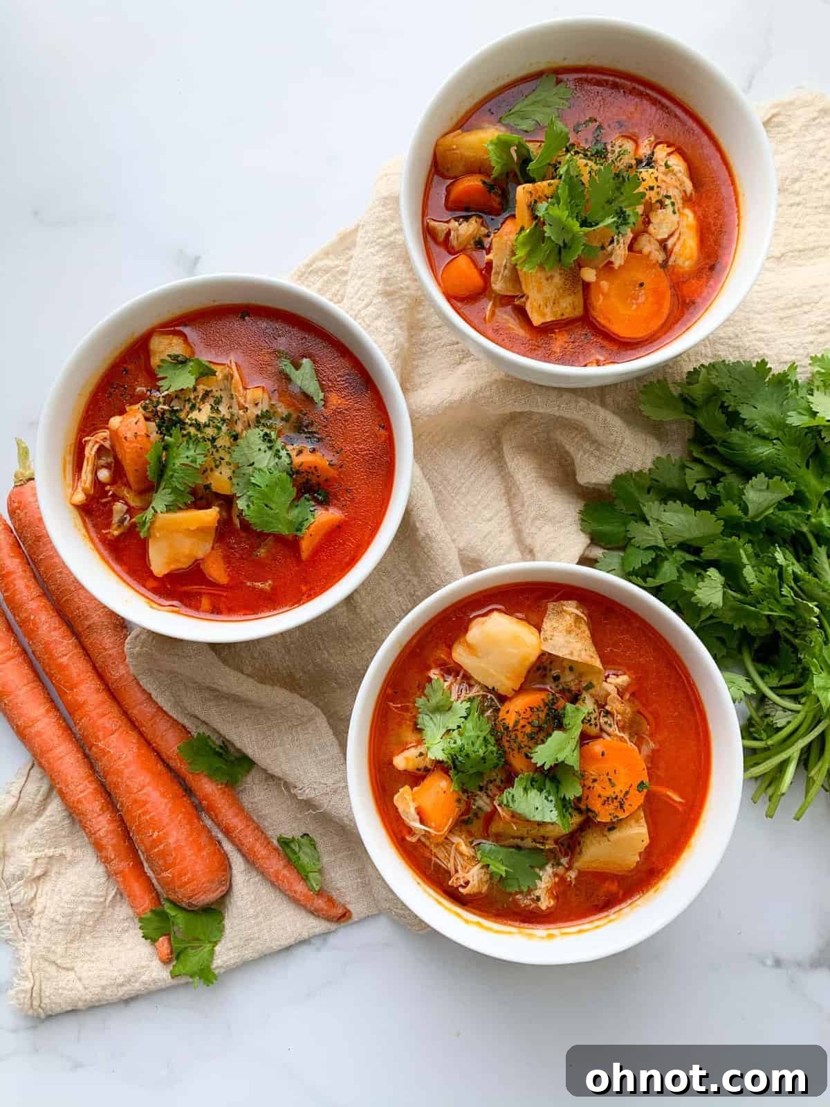 Delicious Whole30 Buffalo Chicken Soup with fresh cilantro garnish