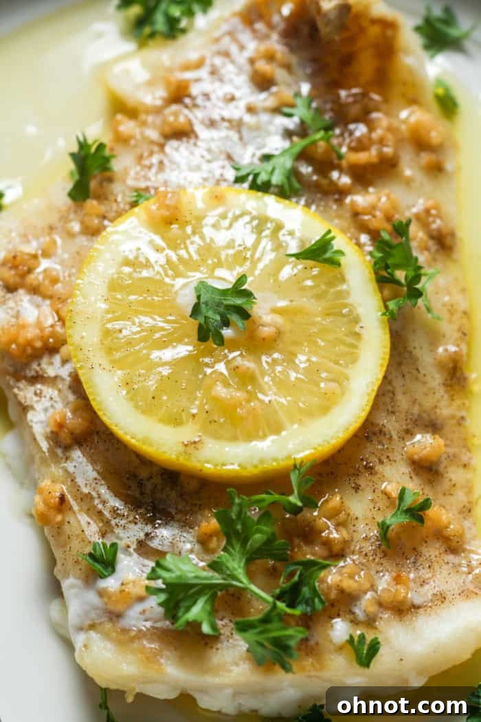 Fish with garlic butter sauce.