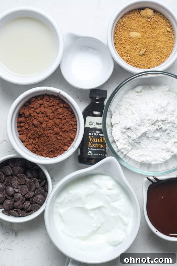 A beautiful flat lay of all the fresh, wholesome ingredients required to make delicious Greek yogurt brownies.