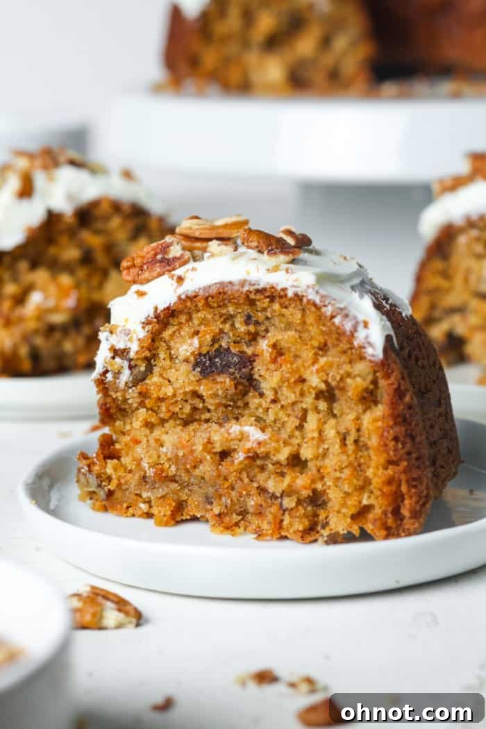 A moist slice of gluten-free carrot cake with pineapple and coconut.