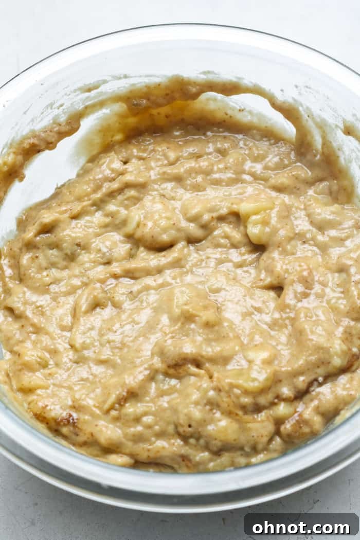 Wholesome banana bread batter in a mixing bowl.