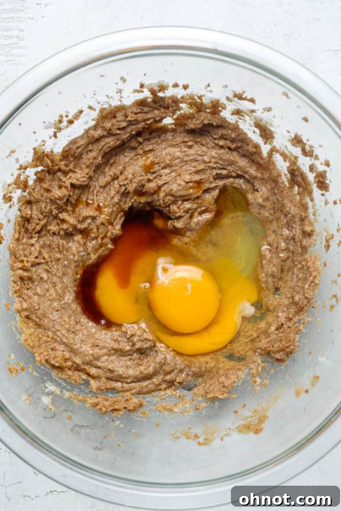 Wet cookie batter with eggs and vanilla mixed in.