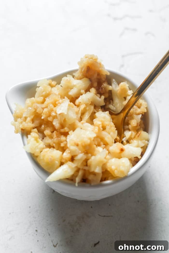 Freshly minced garlic ready for use, a kitchen essential for adding flavor.
