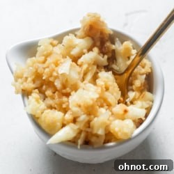 Freshly minced garlic in a bowl, ready for use
