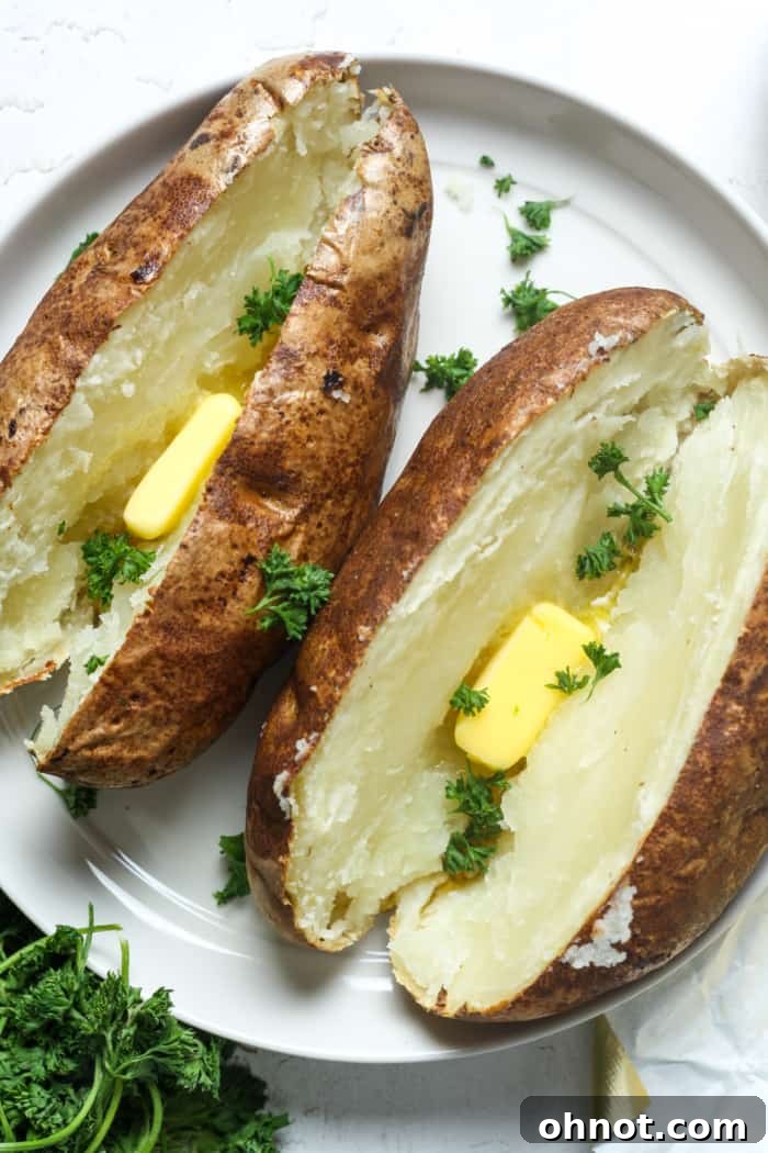 Plate with baked potatoes.