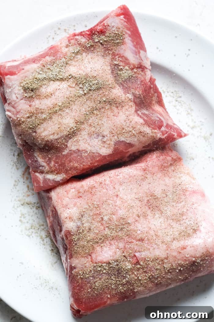Seasoned short ribs, ready for searing.