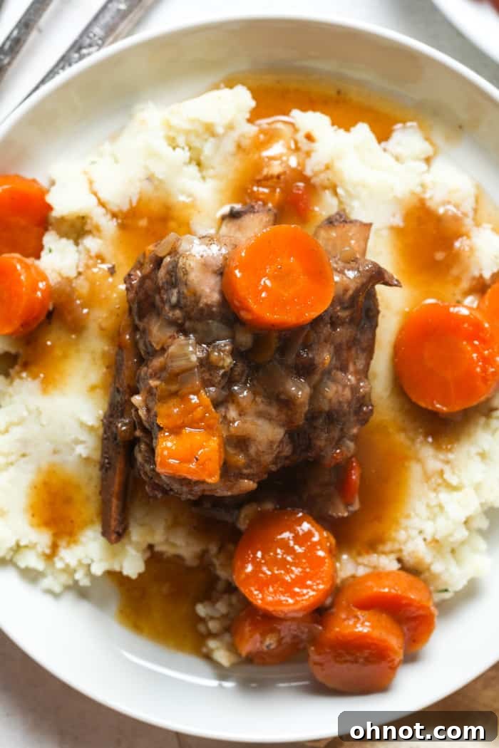 Instant Pot short ribs served with creamy mashed potatoes.
