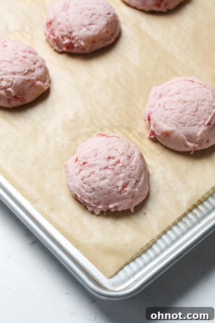 Soft pink strawberry cookies fresh from the oven.