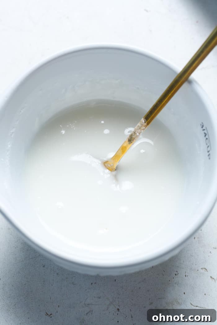 Bowl of creamy white icing.
