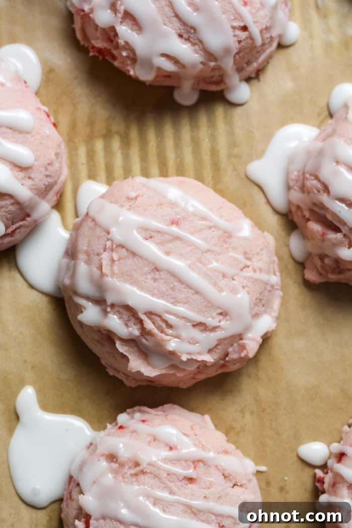 Soft strawberry cookies with a light glaze.