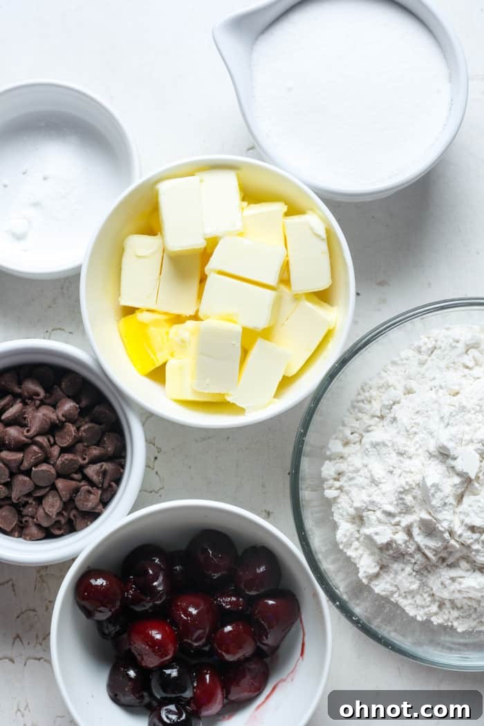 Collection of ingredients for cherry cookies.