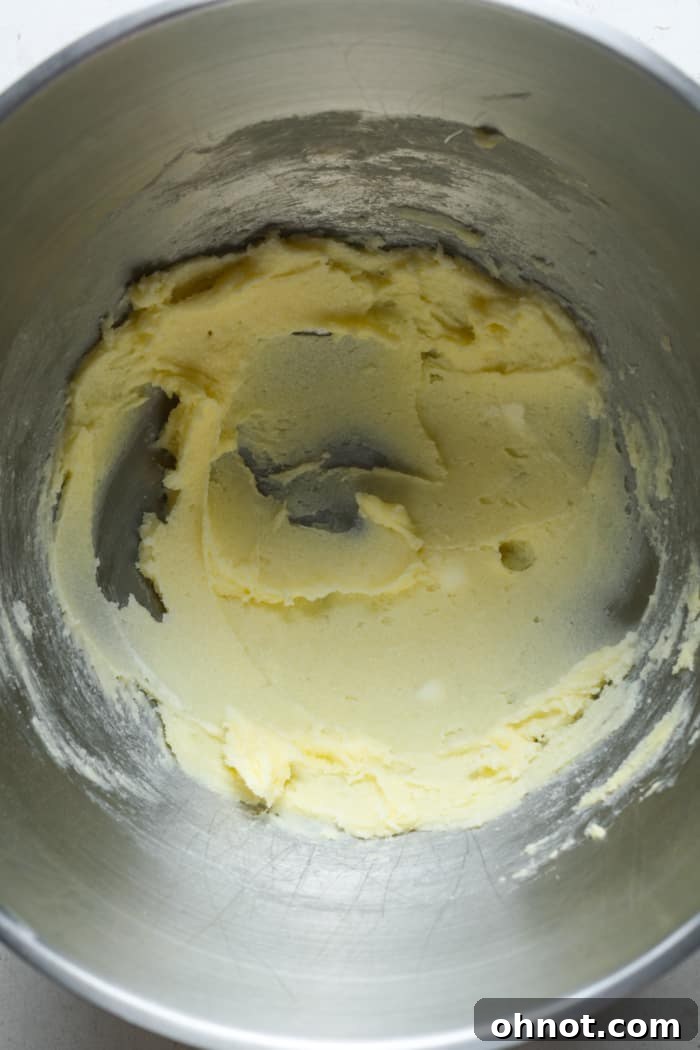 Creaming butter and sugar in a mixer.