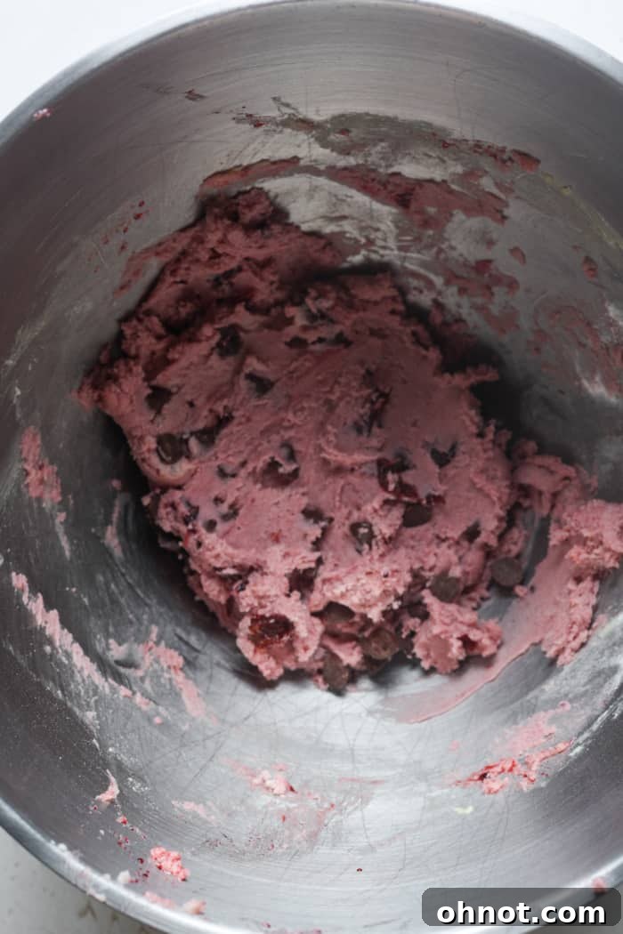 Cookie dough with cherries and chocolate chips.