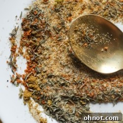Homemade Steak seasoning in a glass jar.