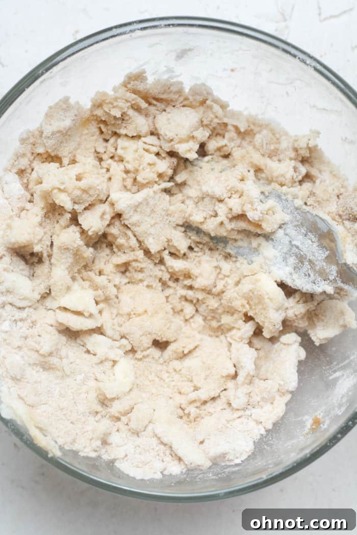 Close-up of the finished buttery streusel topping, perfectly crumbly and spiced with cinnamon.