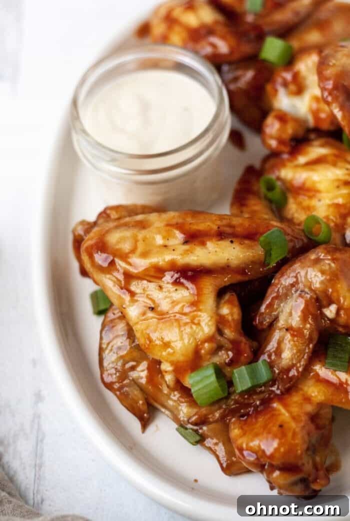 Assortment of Whole30 wings with various sauces and garnishes