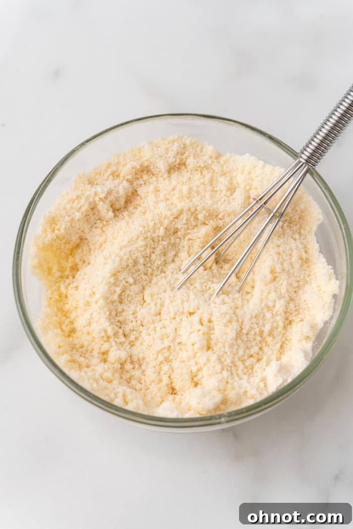 Whisk incorporating almond flour and other dry ingredients.