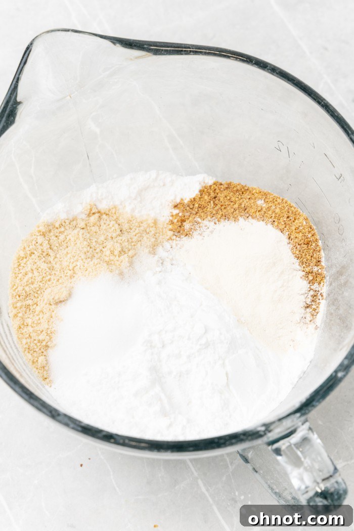 Dry ingredients for gluten-free bread in a mixing bowl.