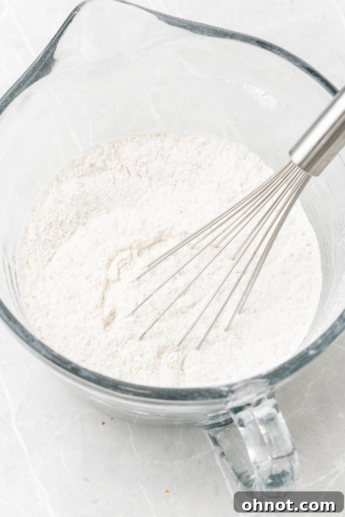 Close-up of whisked gluten-free flour mixture.