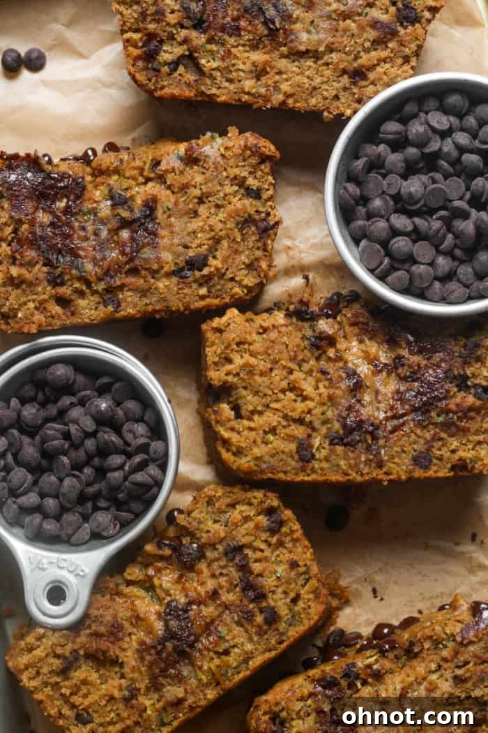 A delectable slice of chocolate chip zucchini bread, showcasing its moist crumb.
