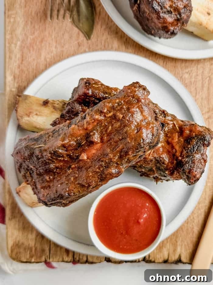 Tender beef back ribs arranged beautifully on a serving plate.