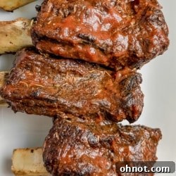 Beautifully plated beef back ribs, ready for serving.