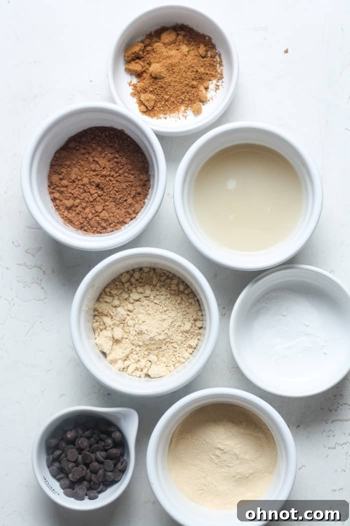 All the wholesome ingredients laid out for making a protein mug cake.