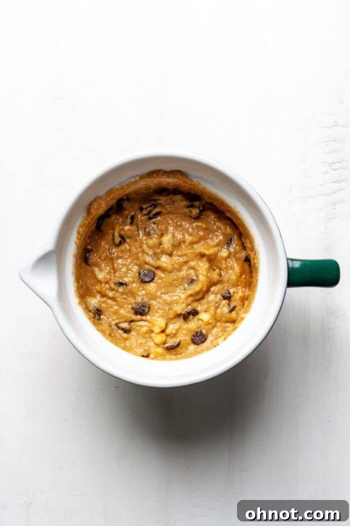 Banana bread dough in a bowl with chocolate chips