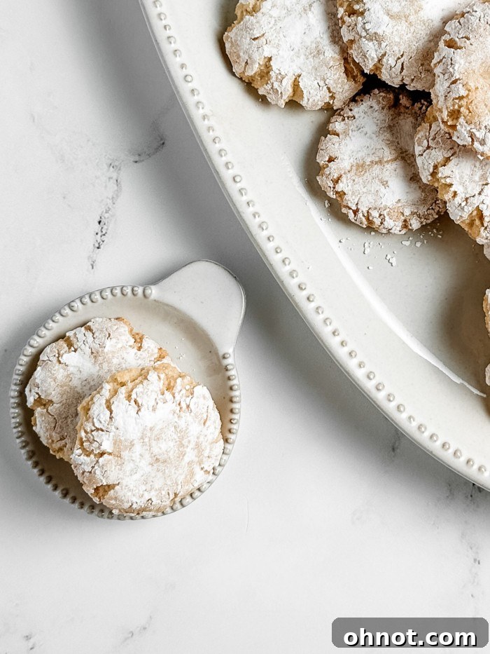 Soft almond flour sugar cookies with a delicate crackled surface.
