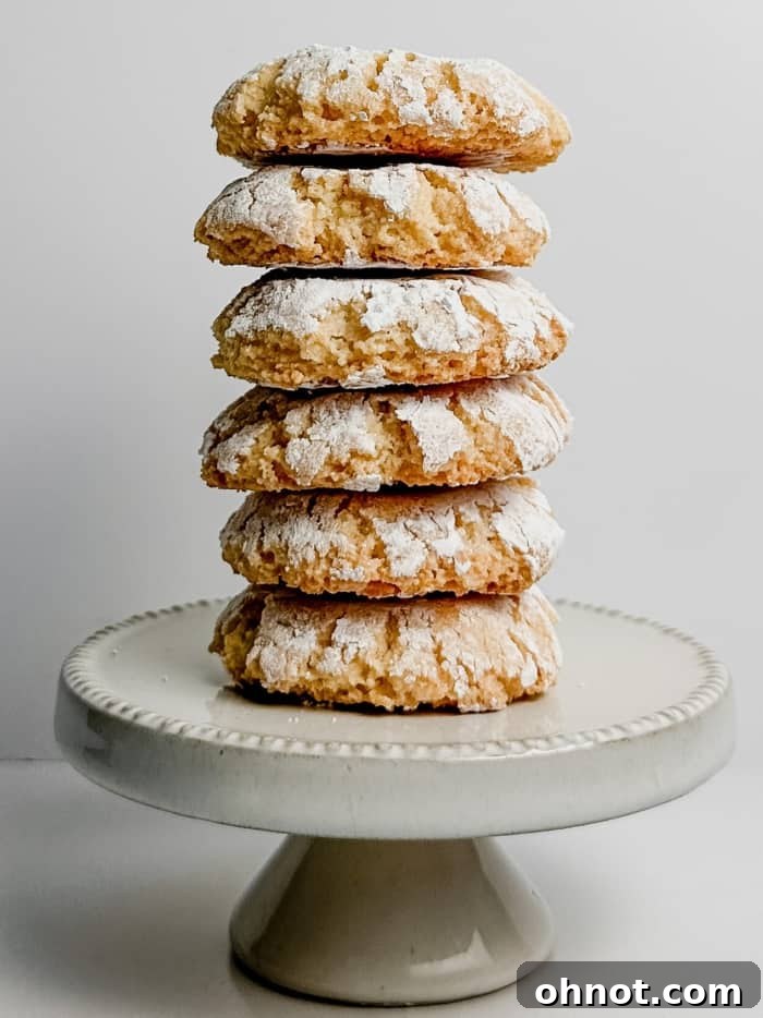 A perfectly arranged stack of soft, chewy Amaretti cookies.