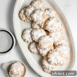 Amaretti cookies, golden and dusted with sugar.