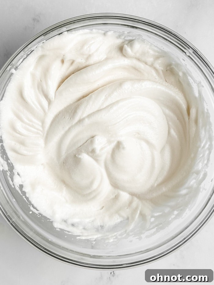 Perfectly beaten egg whites with soft peaks.